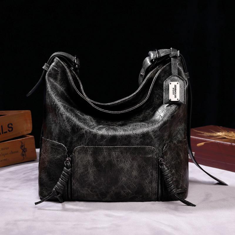 Vintage brand style single shoulder cross-arm capacity women's bag