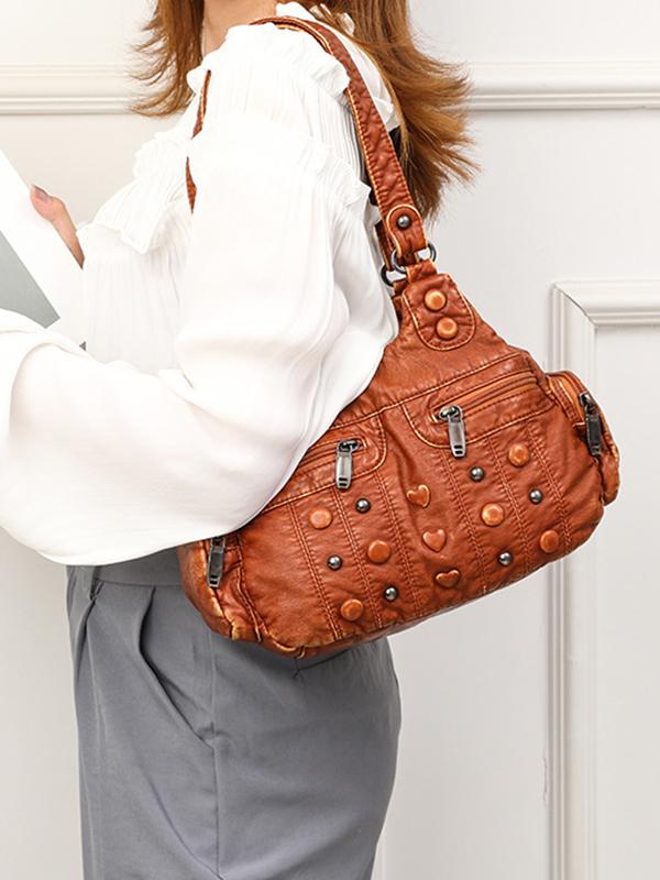 Heart Studded High Capacity Washed Leather Bag