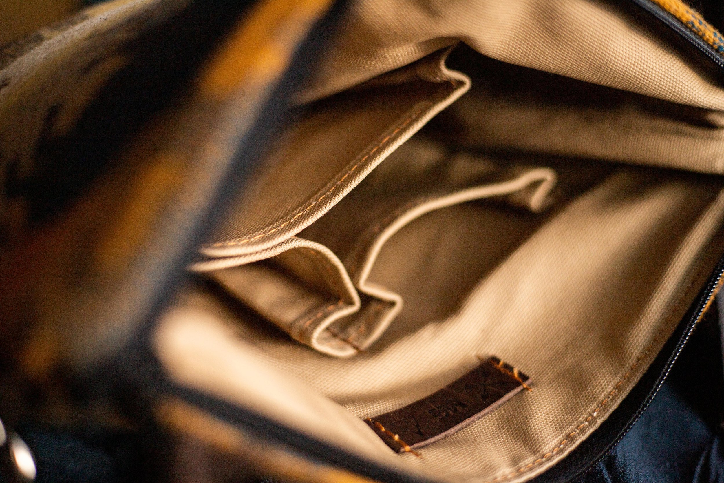 LAND OF BUFFALO WOOL LEATHER BOTTOM CROSS BODY PURSE WITH BROWN WAXED LEATHER