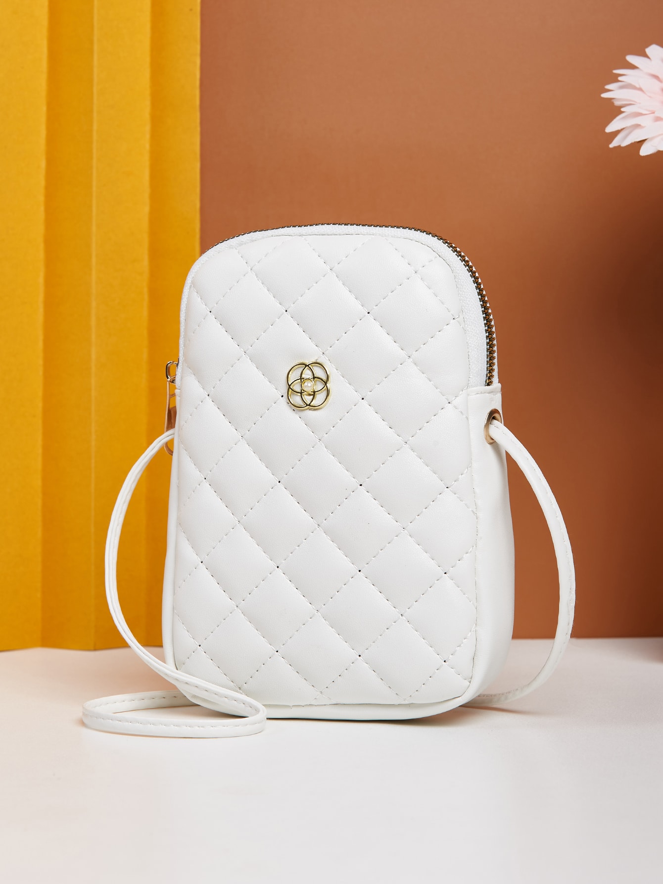 Minimalist quilted metal crossbody bag