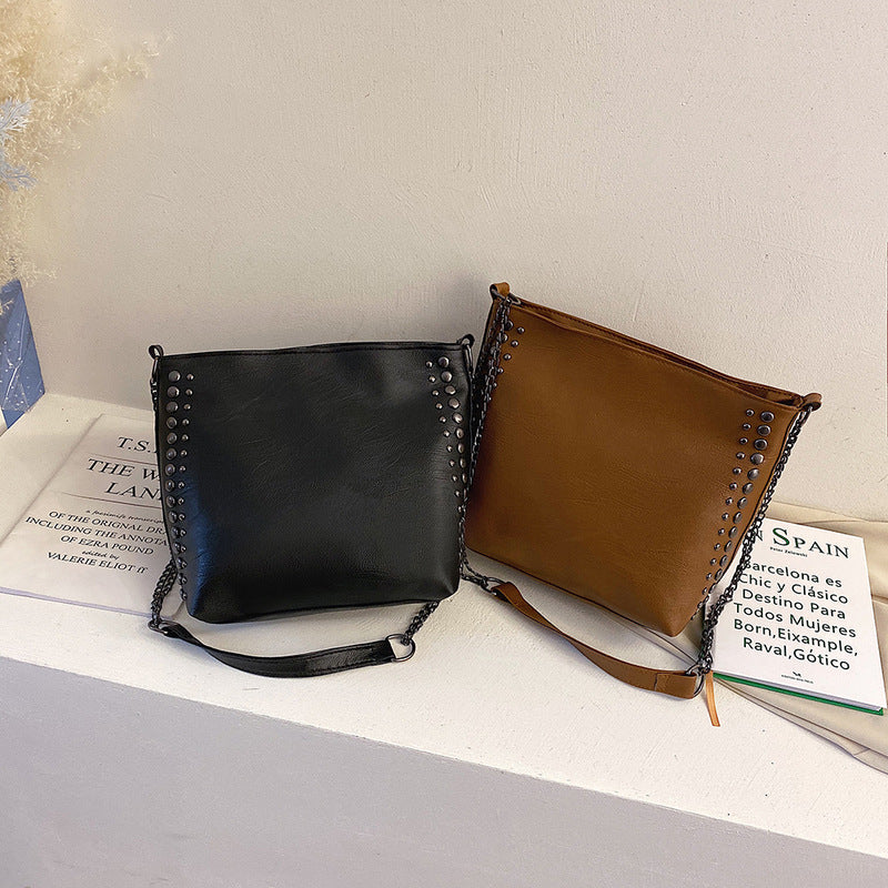 Winter new female bag retro style large capacity one-shoulder bucket bag soft leather rivet messenger bag