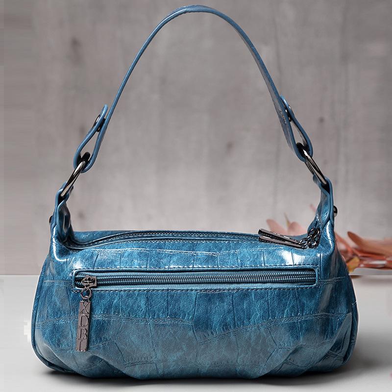 Retro style one-shoulder, cross-slung cloud crease bag